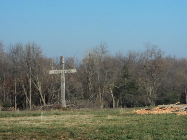 Crosswired Cross Near Church Site