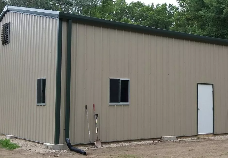 Gutters on Tan Metal Building