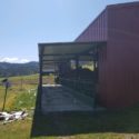 Side View Garage with Overhang | Environmental Impact Steel