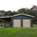 Dark Green-Blue Garage with Overhang